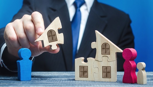 A man gives husband part of house after a divorce. Division of jointly acquired property, conclusion of a marriage contract. Dispute between spouses. Protection of rights, conflict resolution.